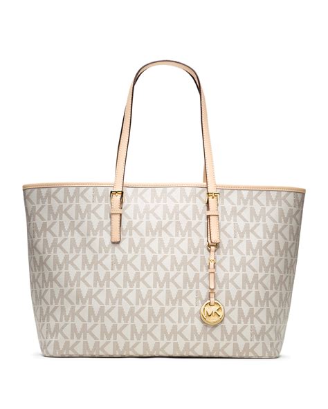 michael kors jet set travel medium multifunction tote bag|michael kors purse with airplanes.